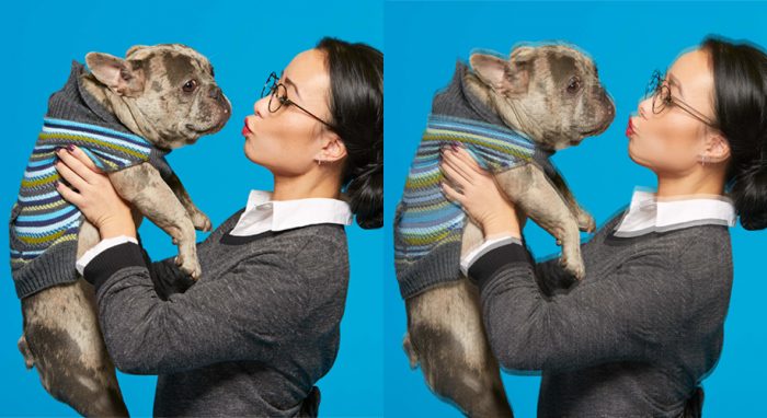 Example of blurriness caused by astigmatism showing woman holding a dog.