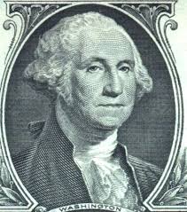 Side profile of George Washington from a dollar bill. The text reads &quot;Washington&quot; below the portrait.