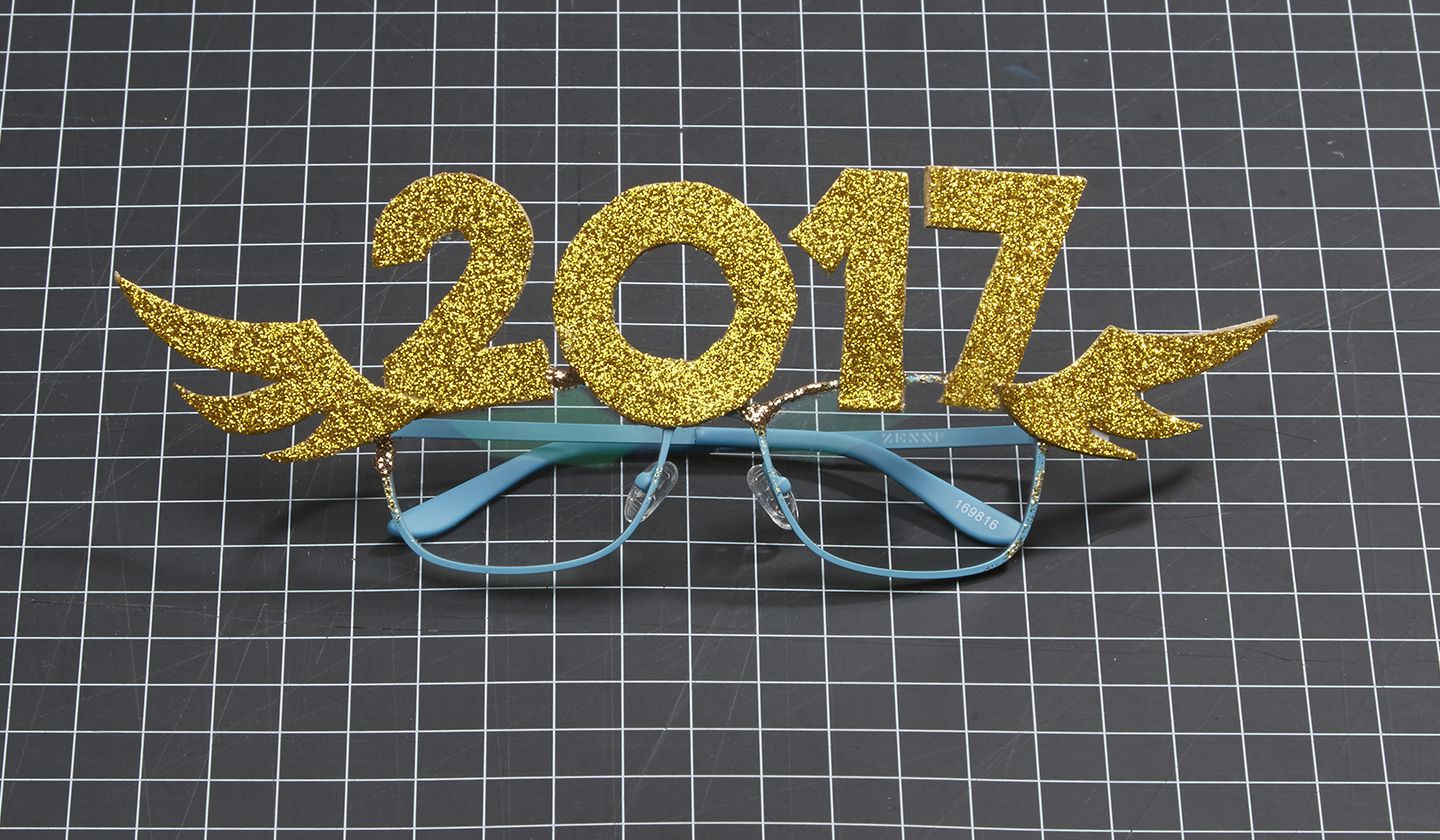 Blue eyeglasses with golden &quot;2017&quot; and wing decorations attached.
