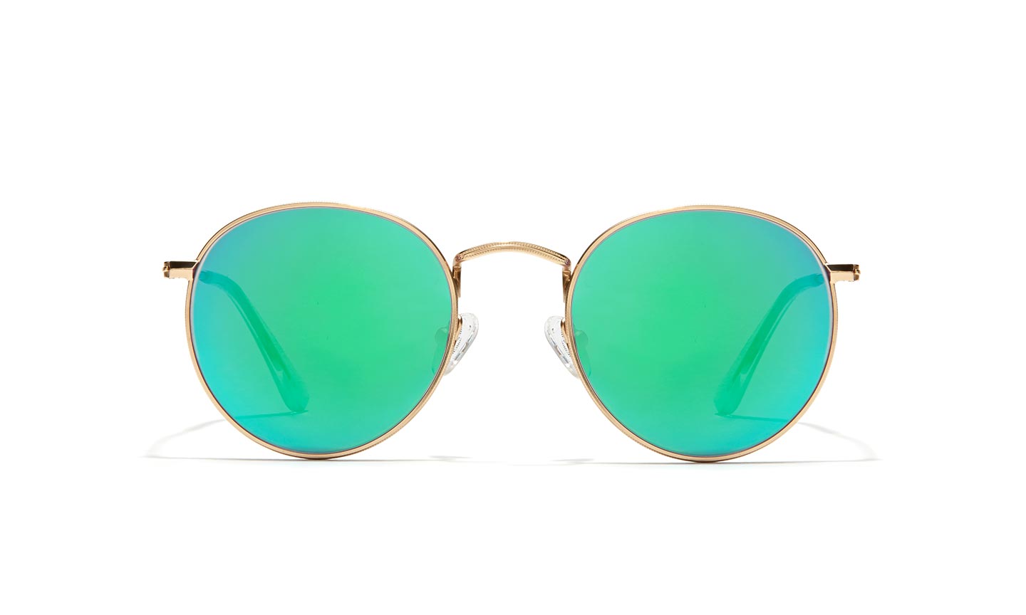 Gold-framed sunglasses with round, reflective green lenses.