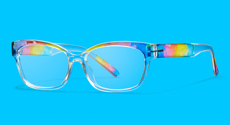 Clear eyeglasses with colorful, abstract rainbow pattern on the temples and arms on a blue background.