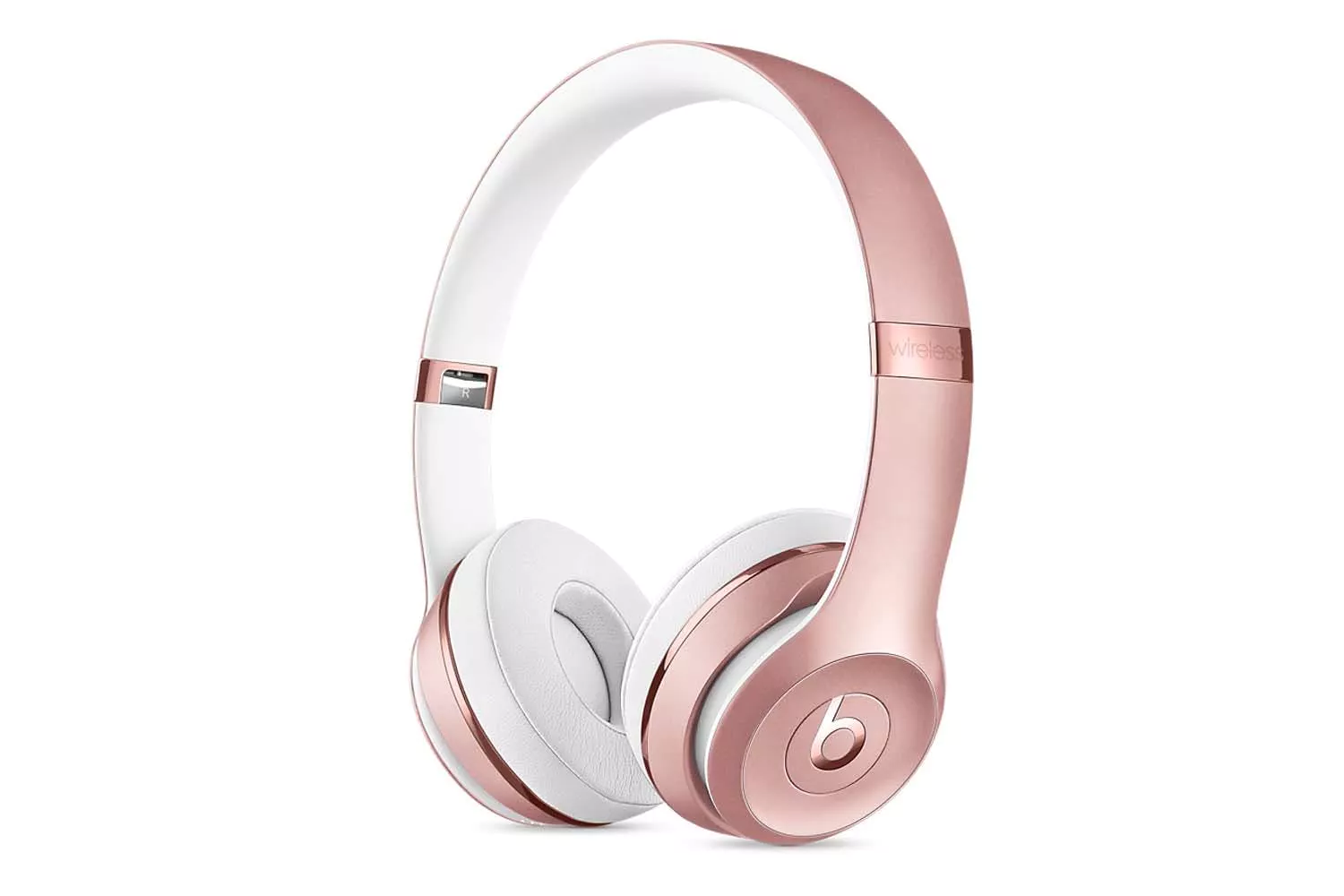 Rose gold Beats wireless over-ear headphones with white ear cushions and &quot;R&quot; indicating the right ear cup.