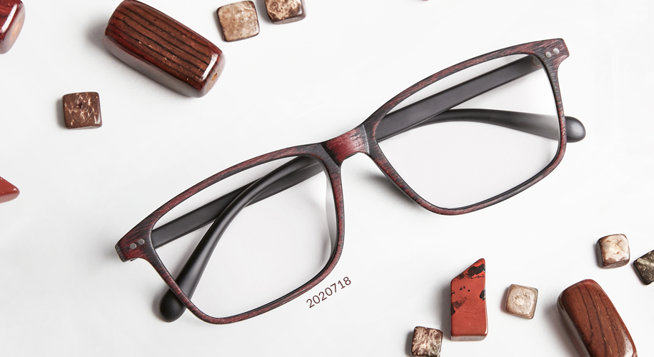 Red and black rectangular eyeglasses with the number 2020718 near the bottom left lens.