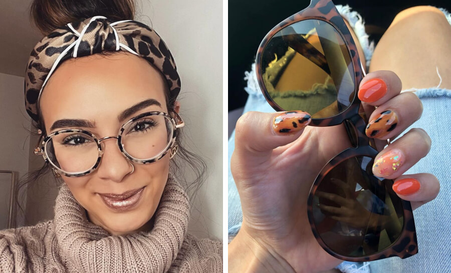 Woman wearing tortoiseshell glasses and leopard print headband; hand holding tortoiseshell sunglasses, with orange and leopard print nail art.