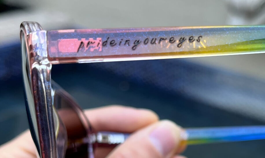 Custom engraving "prideinyoureyes" on Zenni rainbow aviator glasses.