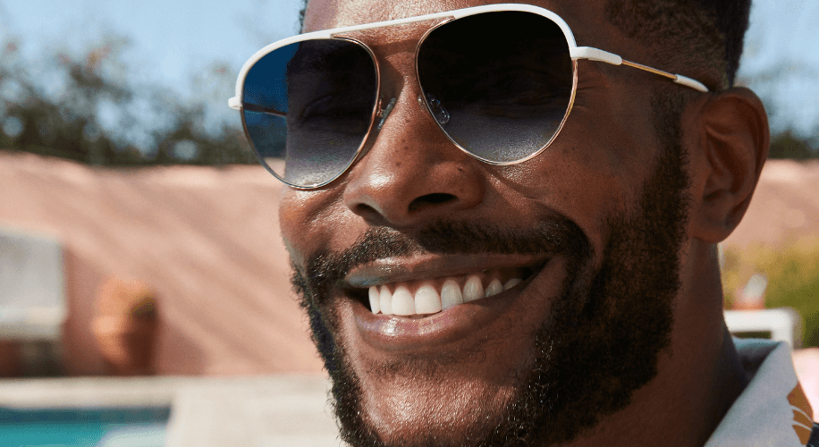 Up close image of man with polarized sunglasses.