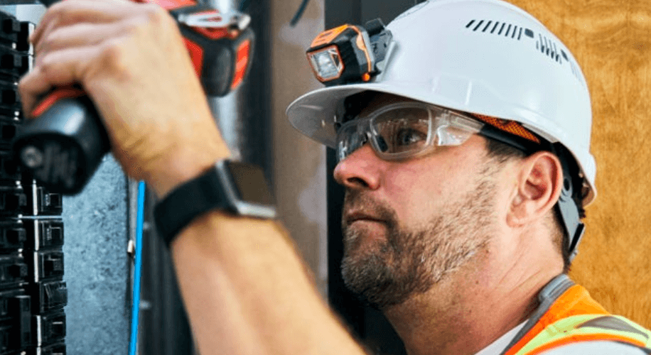 Construction worker wearing safety glasses.