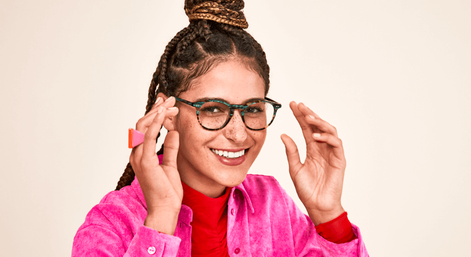 Woman wearing multi-colored eyeglasses.