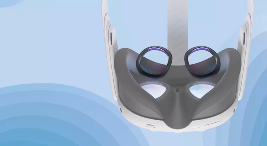 White virtual reality headset with gray padding and twin lenses facing the viewer.
