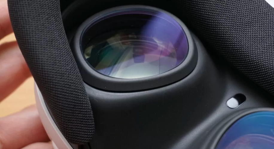 Close-up of a VR headset lens with a black cushioned frame.