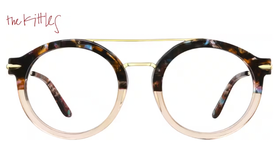The Kittles tortoiseshell round eyeglasses with gold accents.