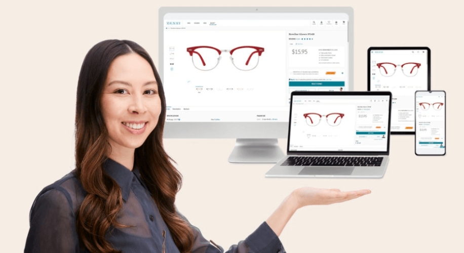 A woman displays various devices showing red-rimmed glasses on Zenni&#039;s website, priced at $15.95.