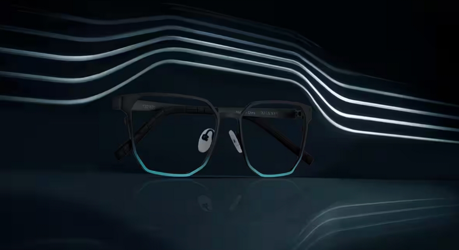 Black and teal eyeglasses with rectangular lenses.