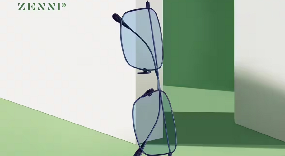 Zenni eyewear with thin frames and reflective lenses.