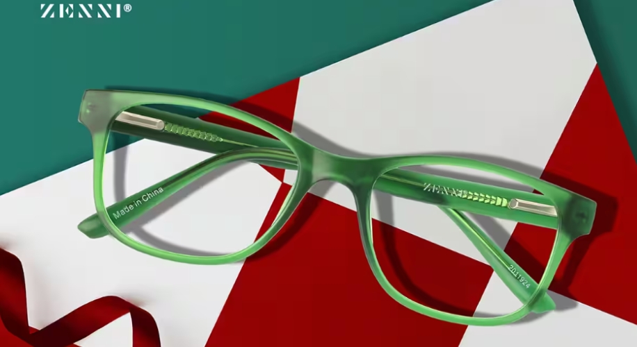 Green Zenni eyeglasses with text &quot;Made in China&quot; on the inner arm; Zenni logo on top left.