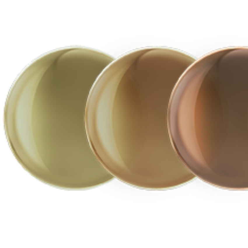 Three brown-tinted contact lenses side by side.