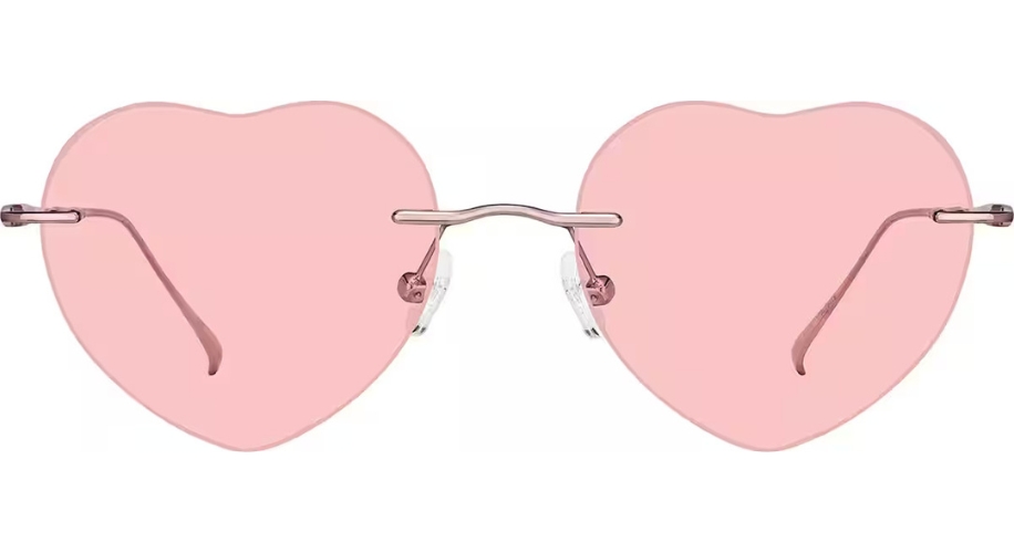 Pink heart-shaped sunglasses with thin metal frames and clear nose pads.