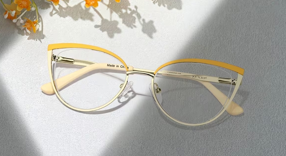 Yellow cat-eye glasses with metal frames; branded text reads &quot;ZGAWEI&quot; on the temples. &quot;Made in China&quot;.