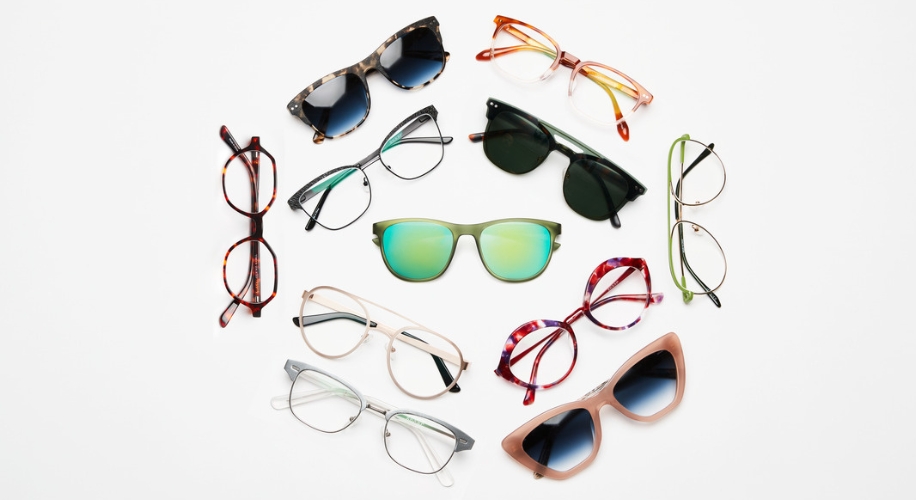 Various styles of eyeglasses and sunglasses arranged in a circle on a white background.