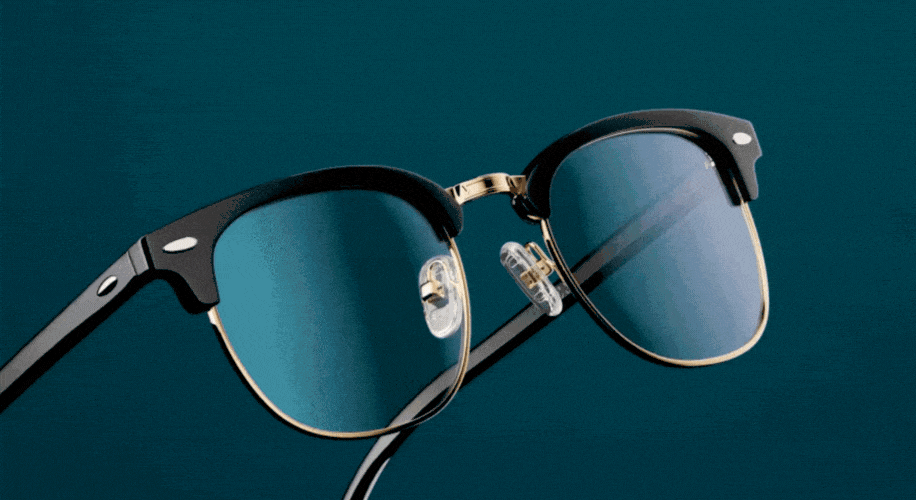 Black and gold sunglasses with a classic round frame design.