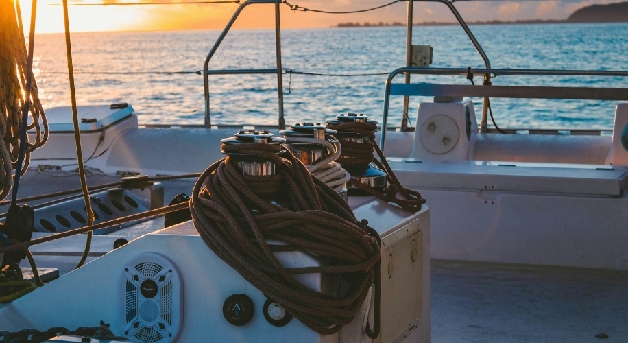 White deck of boat in middle of sea