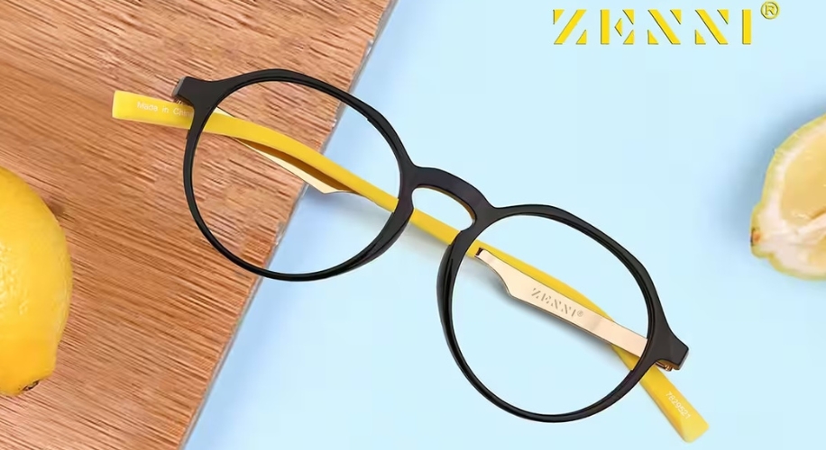 Zenni black and yellow eyeglasses on a wooden surface with text &quot;Made in China&quot; and &quot;ZENNI&quot; visible.
