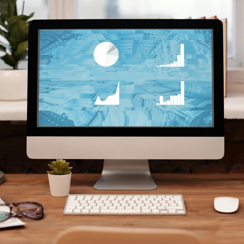 Computer monitor displaying various graphs and charts.