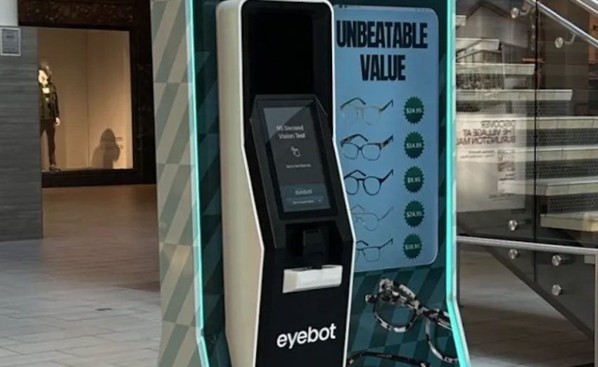 Zenni Vision Center eyeglasses kiosk, "Free Vision Test" and "Unbeatable Value" displayed.