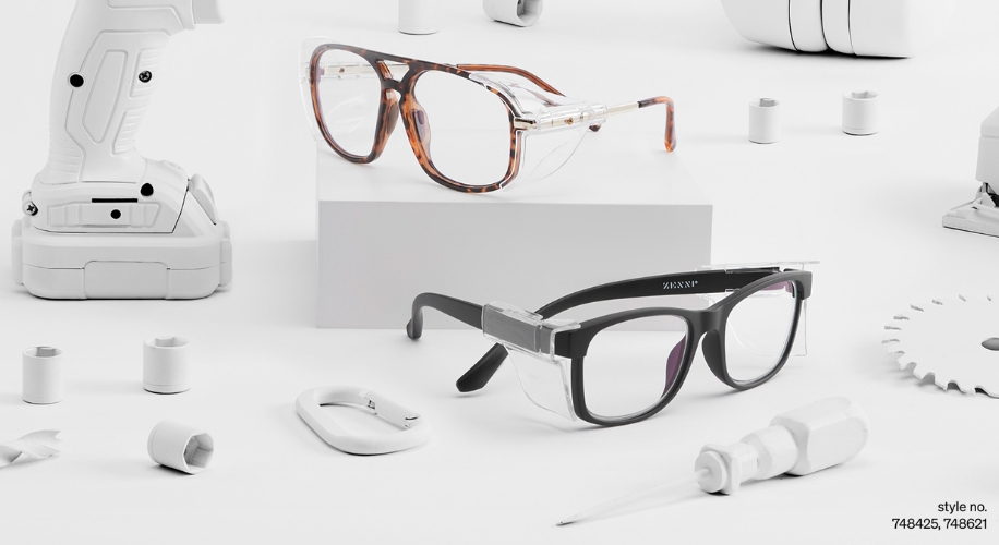 Two pairs of safety glasses, one tortoiseshell and one black. Text: style no. 748425, 748621.