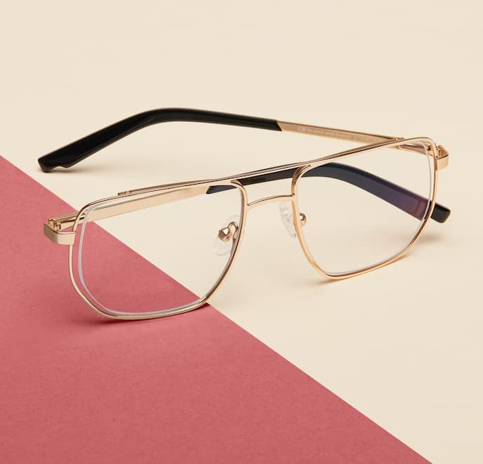 Zenni gold aviator glasses #3224514 I am powerful, against a cream and lavender background