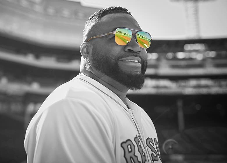 Image of David Ortiz wearing Zenni sunglasses in black and white, with color in the mirror lenses.