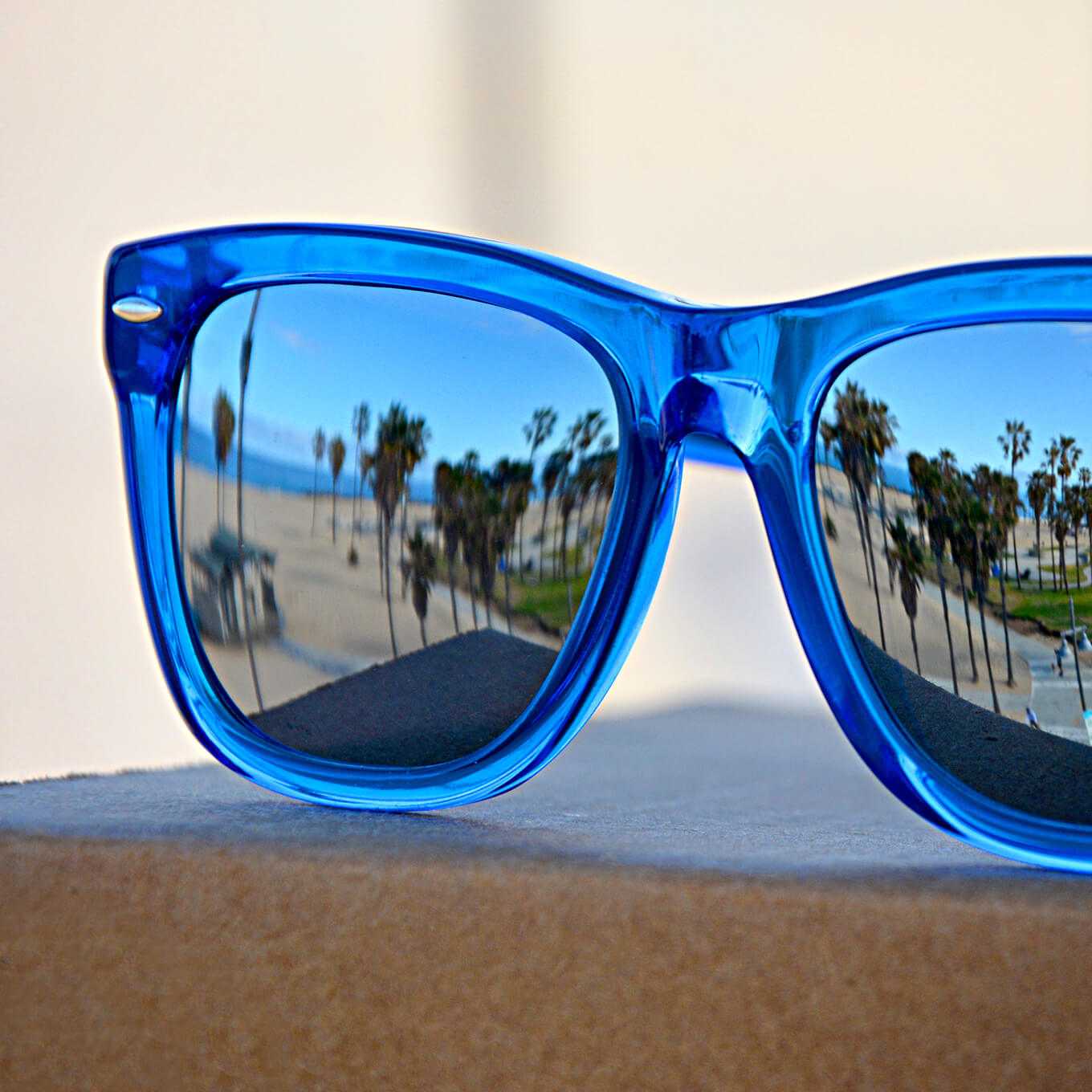 Olvera square acetate sunglasses in bright blue with mirror tint.