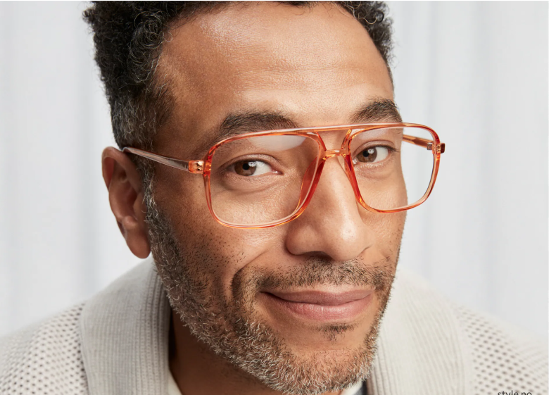 Image of a man smirking wearing Zenni aviator glasses #232915, in front of a white background.