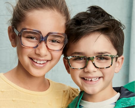 Image of a boy and a girl, smiling and wearing Zenni kids’ square glasses #4450416, and Zenni kids’ rectangle glasses #4431924, respectively.